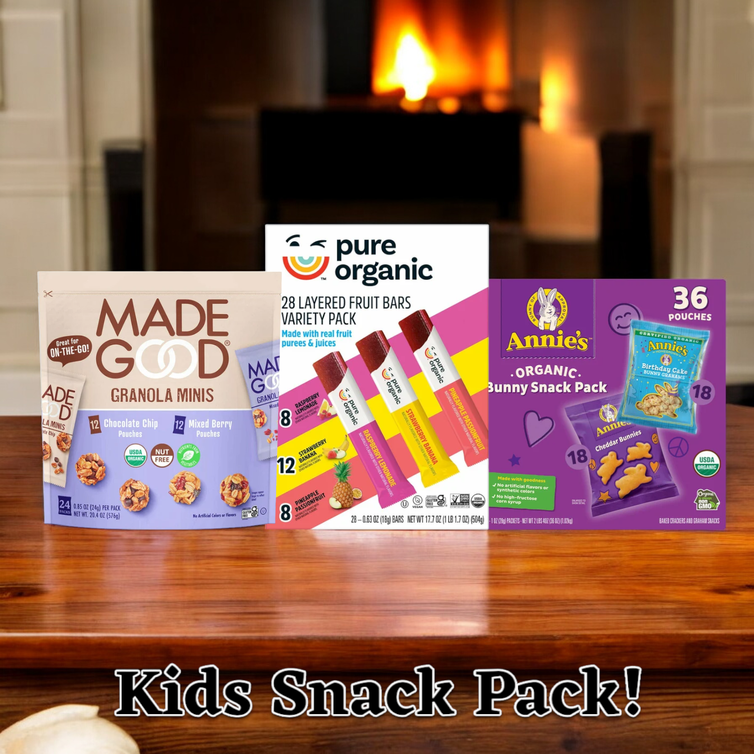 A trio of Kids Snack Packs from Easy Lunches is displayed on a wooden surface, featuring a variety of flavors with MadeGood granola minis, Pure Organic layered fruit bars, and Annie's Organic bunny snacks—all individually wrapped snacks against a blurred background. The packs include one 36-pack of Cheddar and Birthday Cake Grahams, one 28-pack variety fruit bars, and one 12-pack each of MadeGood granola minis and mixed berry pouches.