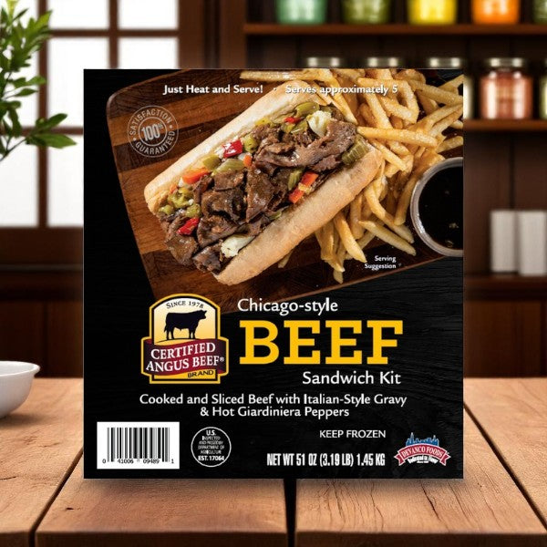 A box of Devanco Foods Chicago-Style Beef Sandwich Kit (51 oz) displays Italian beef sandwiches with Certified Angus Beef slices, gravy, hot peppers, fries, and bold Devanco branding on the front.