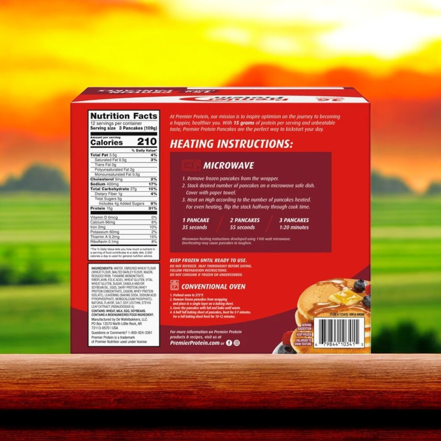 The packaging of Premier Protein Pancakes – 36-Count -3 Count features nutrition facts, heating instructions, and an image of the high-protein, low-sugar pancakes. A blurred field and sunset create a wholesome breakfast mood as you start your day right with Premier Protein.