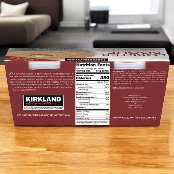 A box of Kirkland Signature Lobster Bisque-1 Count sits invitingly on the table, ideal for seafood enthusiasts. The nutrition facts and ingredients are clearly visible on the back, ensuring a delightful and informed dining experience.