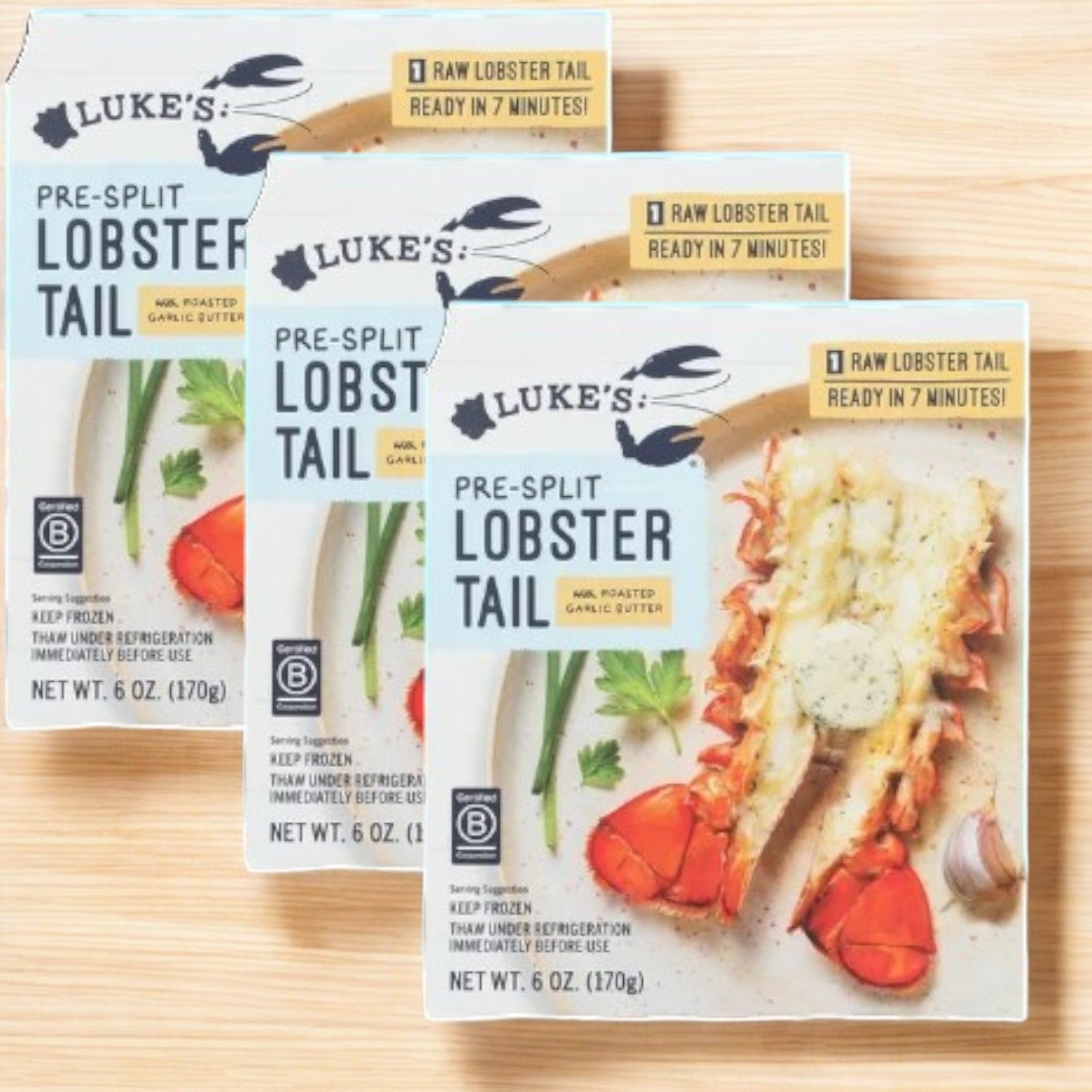 Enjoy three boxes of Luke's Lobster Pre-Split Lobster Tail with roasted garlic butter, offering wild-caught lobster "Ready in 7 Minutes!" Each box features an enticing serving suggestion image.