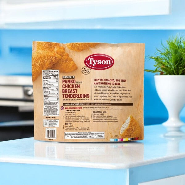 A 5-lb bag of Tyson Panko Breaded Chicken Breast Tenderloins is on the kitchen counter, with its nutritional info clearly displayed on the package.