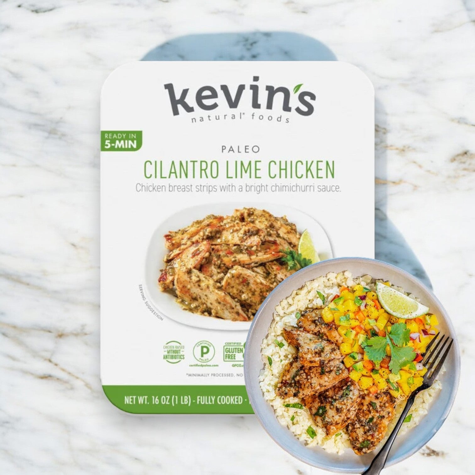 Image of Kevin's Cilantro Lime Chicken - 1 Box 16 oz packaging alongside a plated dish of the marinated chicken breast with rice and vegetables. The packaging from Kevin's claims this pre-cooked meal is ready in 5 minutes.