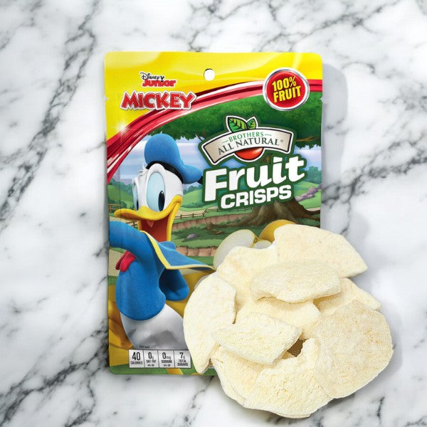 A package of Brothers All Natural Disney Freeze-Dried Asian Pear Fruit Crisps featuring Donald Duck on the front, with freeze-dried Asian pears arranged in front of the package on a marble surface, offers a delightful and healthy snack for children.