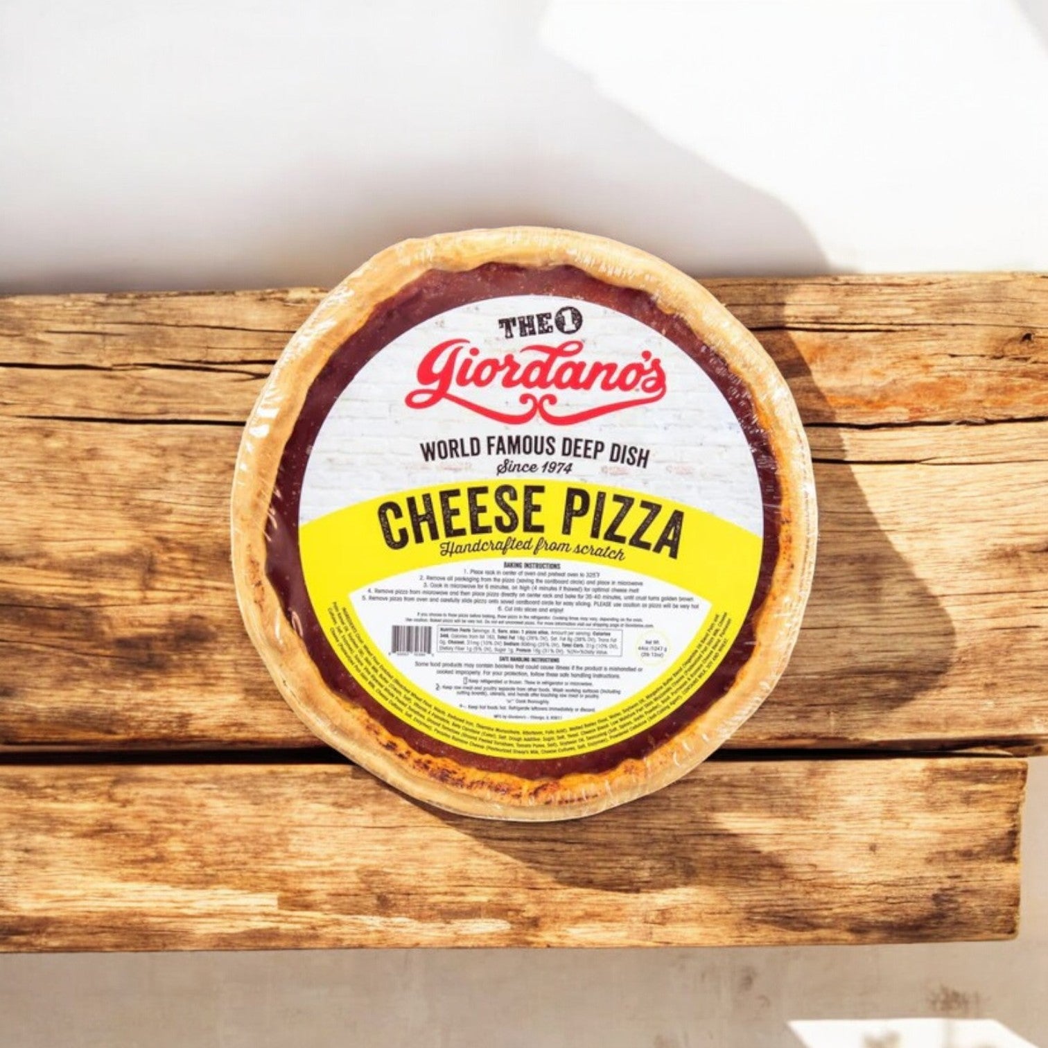 A Vienna Beef Mini Bagel Dogs & 2 Giordano's Deep Dish Pizzas! package from Easy Lunches, perfect for parties and boasting free shipping, captures a Chicago feast's essence with its iconic deep dish pizza presentation.