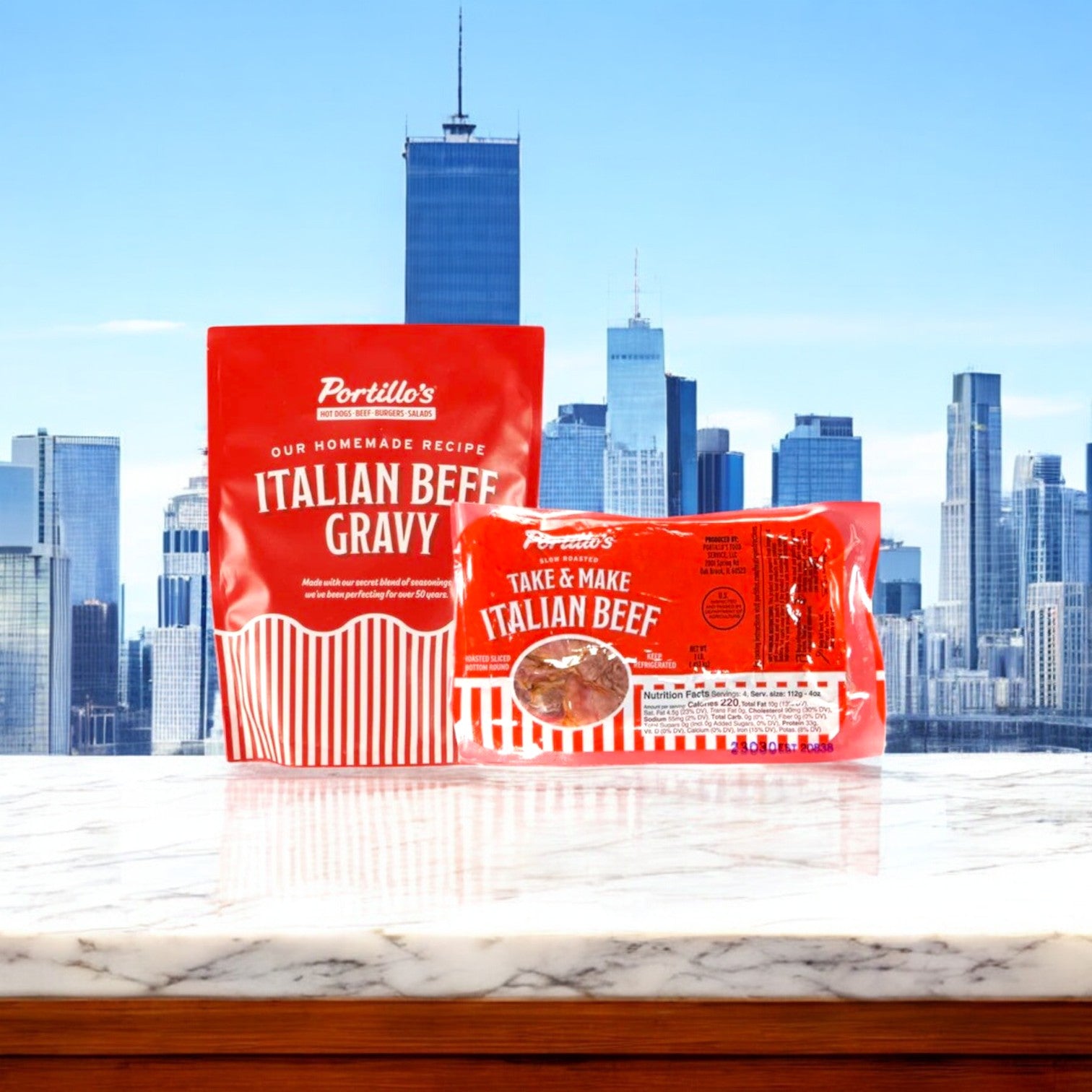 Vienna Beef and Portillo's 3-Pack Combo, featuring 8 Franks, 8 Polish Sausages, and Portillo's Italian Beef Gravy (1 Pound), rests on a marble surface with a Chicago skyline backdrop, capturing the essence of city-style dining. Brand: Easy Lunches.