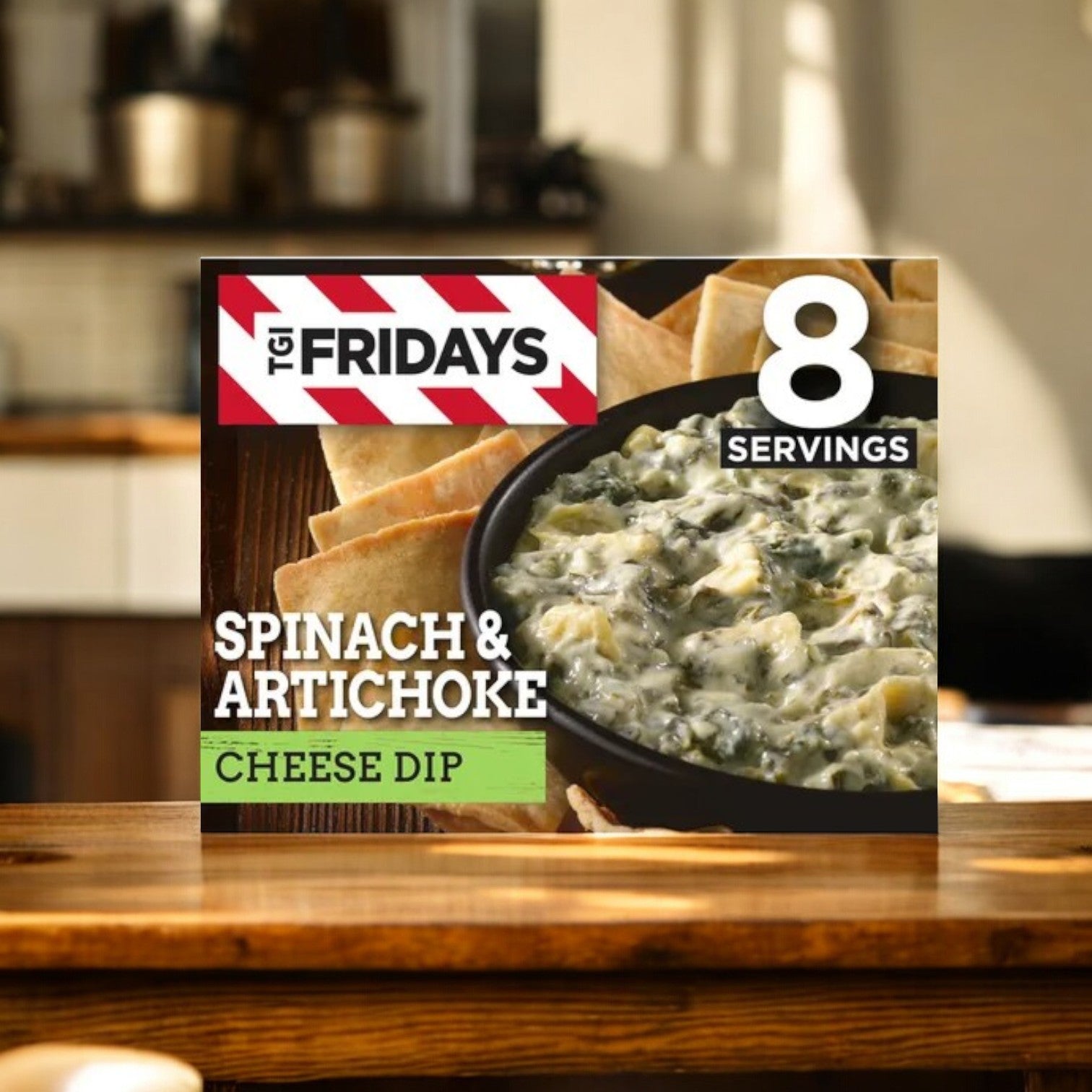 A TGIF Fridays Spinach & Artichoke Cheese Dip Frozen Snack, a delicious appetizer, rests elegantly on a wooden table, ideal for 8 servings.