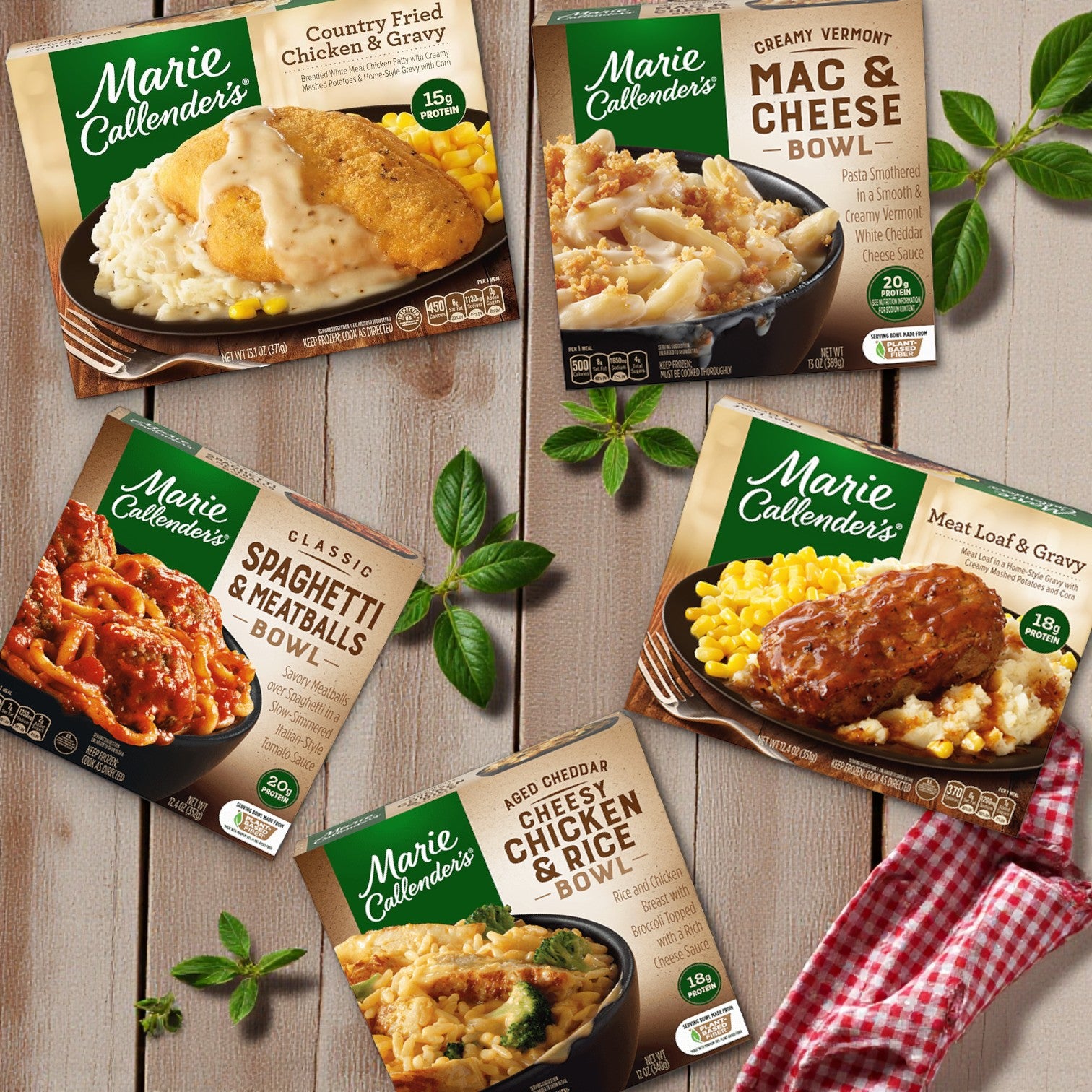 Marie Callender’s Comfort Classics Entrée Combo – 5 Delicious Meals from Marie Callender's features Country Fried Chicken, Mac & Cheese, Spaghetti & Meatballs, Meat Loaf & Gravy, and Aged Cheddar Chicken & Rice displayed on a tabletop.