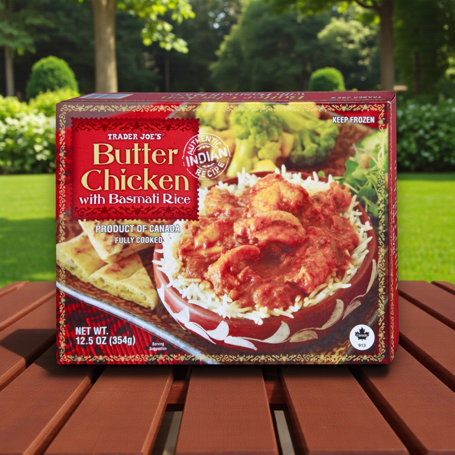 A 3-pack variety of Easy Lunches Trader Joe’s Chicken Tikka Masala & Butter Chicken with Basmati Rice is set outdoors on a wooden table—ideal for fans of convenient Indian cuisine meals.