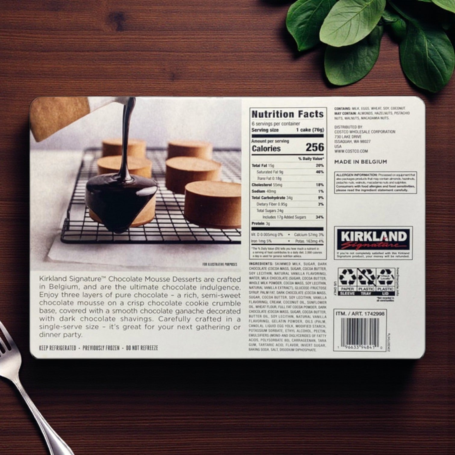 A 6-count package of Kirkland Signature Chocolate Mousse Desserts (2.6 oz each) features mousse cakes in rich chocolate glaze, with premium cocoa, nutrition facts, ingredients, and the Kirkland Signature brand label.
