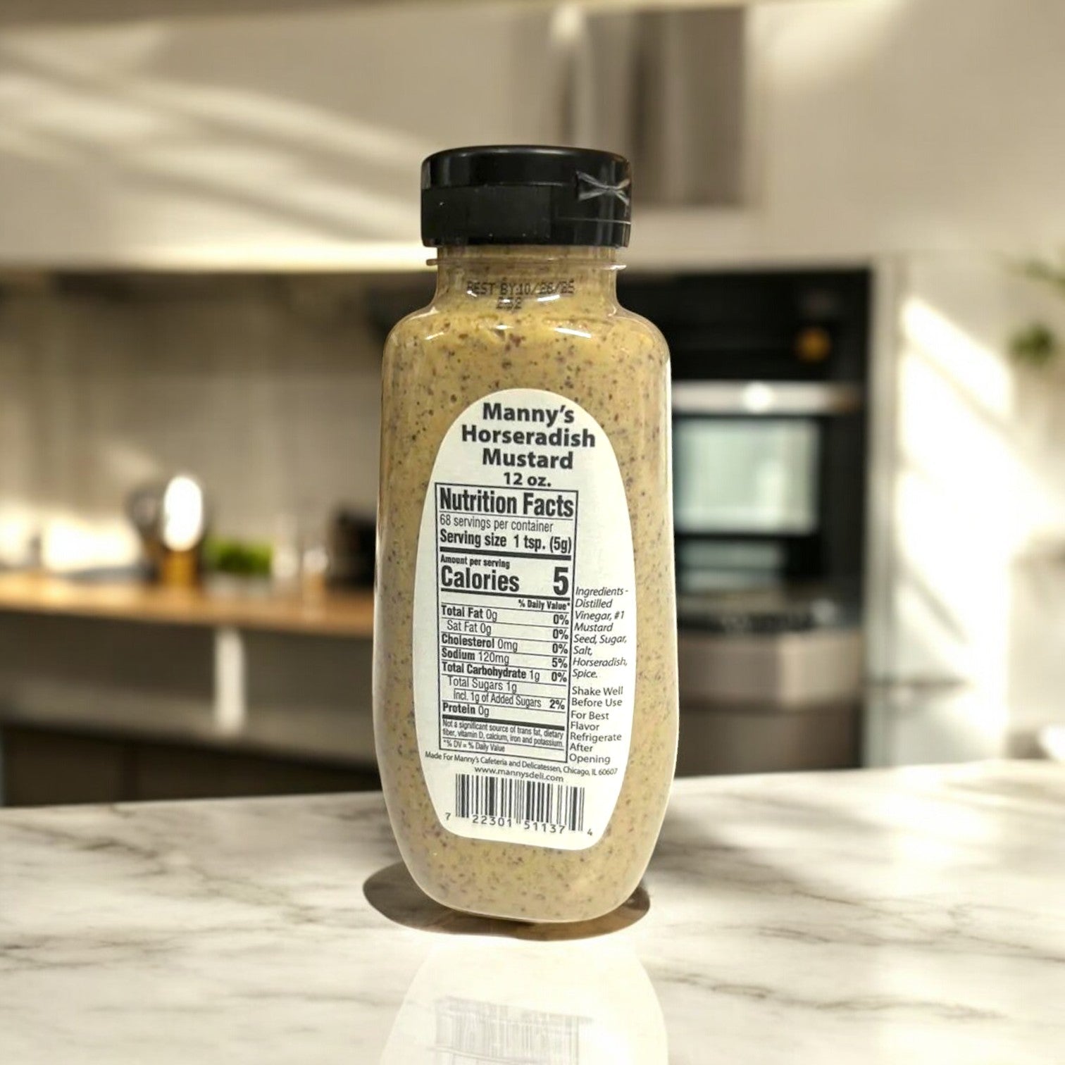 A 3-count pack of Manny's Deli Horseradish Mustard stands on a kitchen counter, flaunting its bold and tangy condiment label featuring nutrition facts and ingredients. This unique twist on mustard promises to elevate any dish with its distinct flavor.