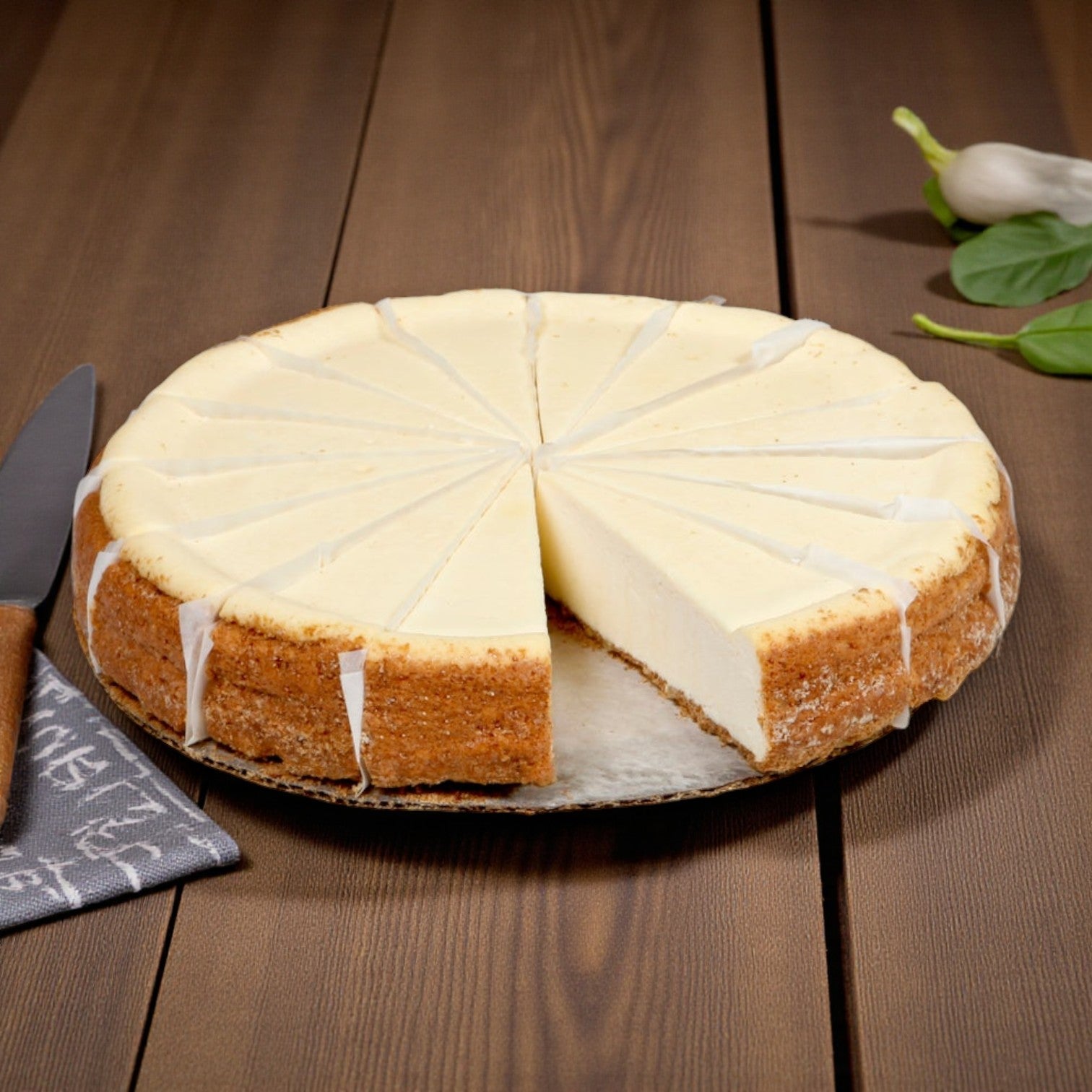 Easy Lunches Frozen Chef's Quality Steakhouse Style Cheesecake is pre-sliced into 12 portions with a graham cracker crust, ready to serve right out of the box.