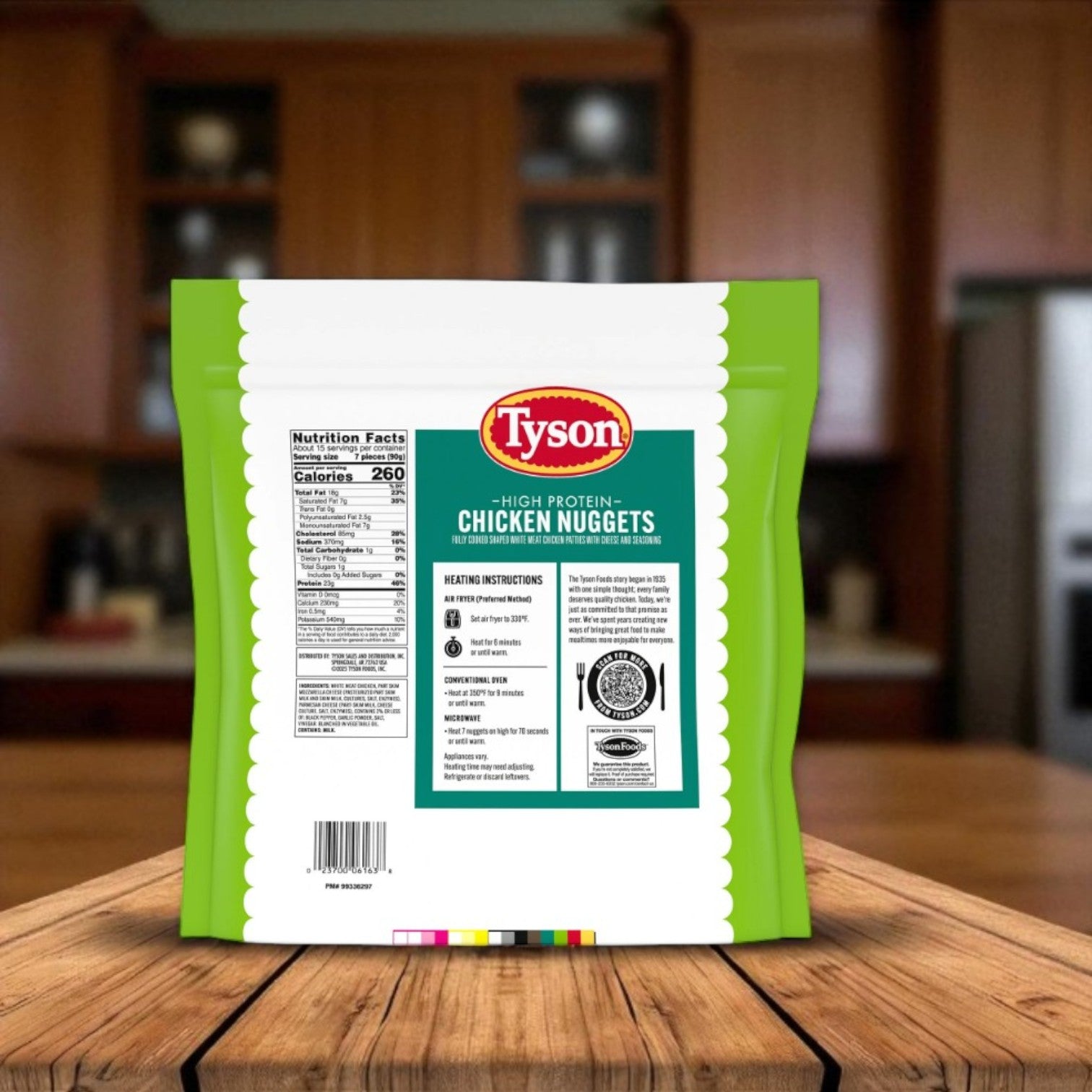 A bag of Tyson Simple Ingredient Chicken Nuggets, Frozen, 3 lbs sits on a kitchen's wooden surface, showing the nutrition facts and heating instructions printed on the back of these all-natural nuggets.